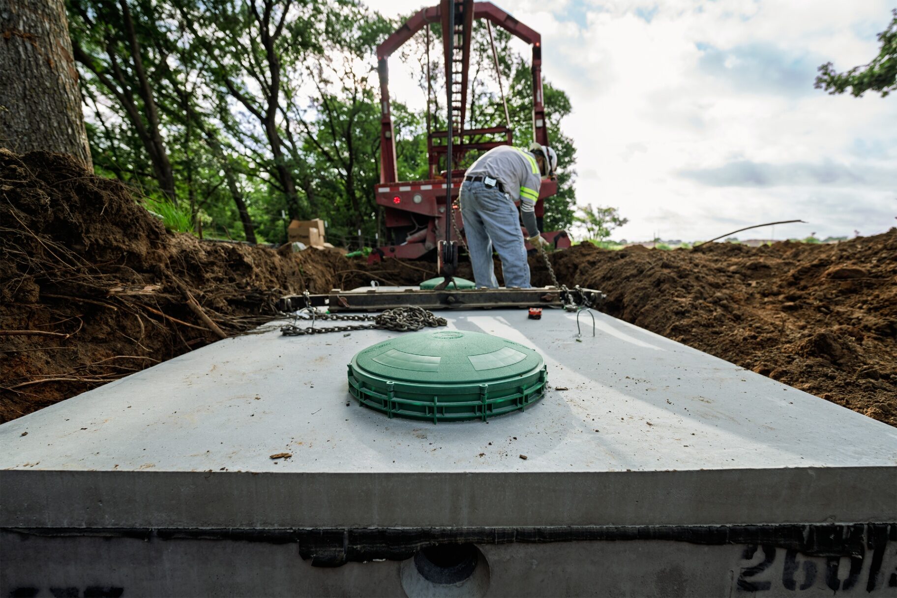 Septic tank set in place at a Burleson, Texas job site