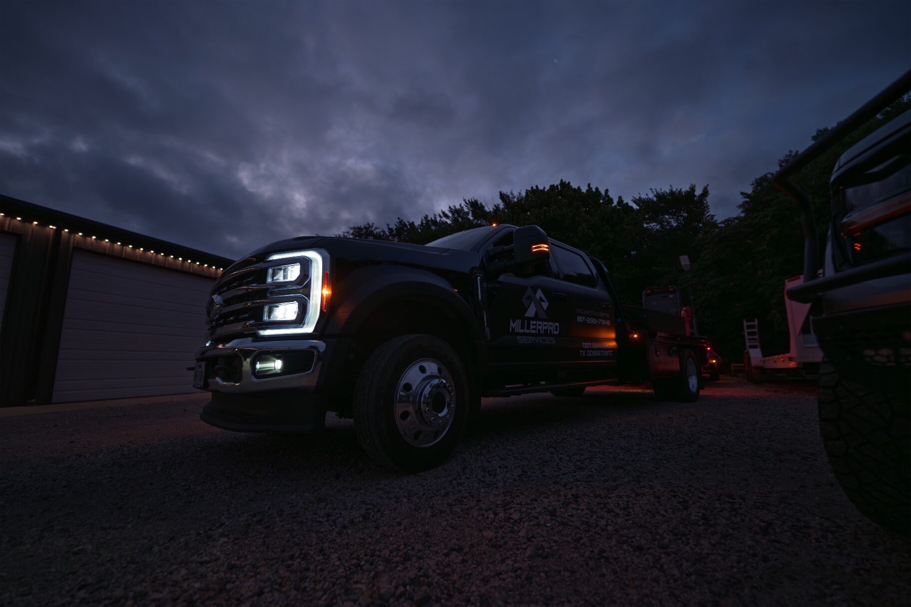 MillerPro Services truck at a job site at dusk in Burleson, Texas